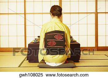 Stock Image - rear view of a 
young woman wearing 
a kimono. fotosearch 
- search stock 
photos, pictures, 
images, and photo 
clipart