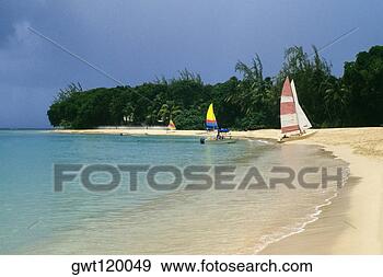 Stock Photograph - sail boats are 
seen at a seashore 
near sandy lane 
hotel beach. fotosearch 
- search stock 
photos, pictures, 
images, and photo 
clipart