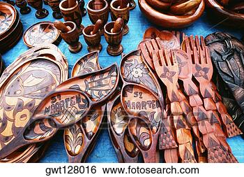 Stock Photo - an exhibition 
of souvenirs in 
wood, st martin. 
fotosearch - search 
stock photos, 
pictures, images, 
and photo clipart