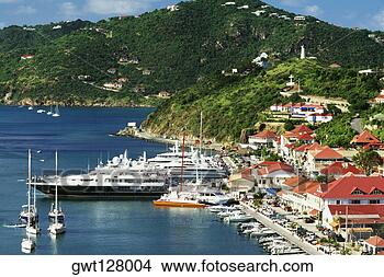 Stock Photo - side view of boats 
docked at a shore, 
st bant's. fotosearch 
- search stock 
photos, pictures, 
images, and photo 
clipart