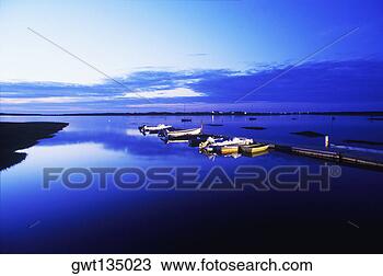 Stock Photo - boats docked at 
a pier, cape cod, 
massachusetts, 
usa. fotosearch 
- search stock 
photos, pictures, 
images, and photo 
clipart