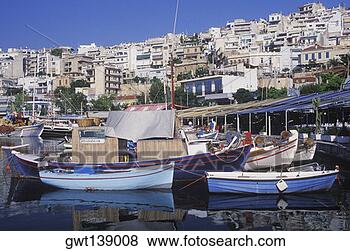 Stock Photo - boats moored at 
a harbor. fotosearch 
- search stock 
photos, pictures, 
images, and photo 
clipart