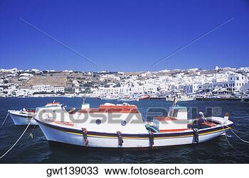 Stock Photo - two fishing boats 
moored in the 
sea. fotosearch 
- search stock 
photos, pictures, 
images, and photo 
clipart