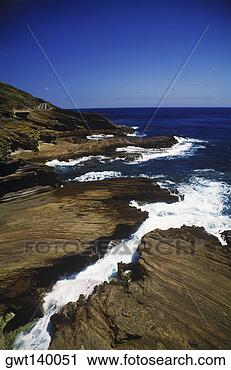 Stock Photography - waves breaking 
on rocks, hawaii, 
usa. fotosearch 
- search stock 
photos, pictures, 
images, and photo 
clipart