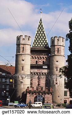 Stock Photography - cars in front 
of a building, 
city gate, basel, 
switzerland. fotosearch 
- search stock 
photos, pictures, 
images, and photo 
clipart
