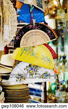 Stock Photo - close-up of folding 
fans hanging in 
a store. fotosearch 
- search stock 
photos, pictures, 
images, and photo 
clipart