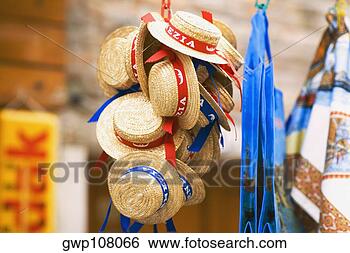 Stock Photo - close-up of hats 
hanging at a market 
stall. fotosearch 
- search stock 
photos, pictures, 
images, and photo 
clipart