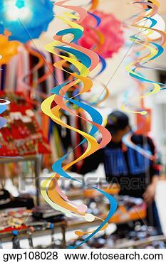 Stock Photo - close-up of multi-colored 
streamers hanging. 
fotosearch - search 
stock photos, 
pictures, images, 
and photo clipart