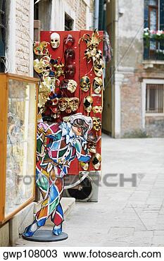 Stock Photo - different types 
of masks hanging 
on the door of 
a store. fotosearch 
- search stock 
photos, pictures, 
images, and photo 
clipart