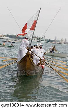 Stock Photo - group of people 
rowing a gondola, 
venice, veneto, 
italy. fotosearch 
- search stock 
photos, pictures, 
images, and photo 
clipart