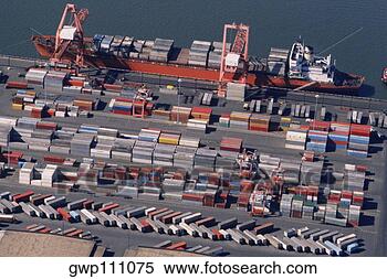 Stock Image - container trailers 
waiting to be 
loaded onto a 
ship. fotosearch 
- search stock 
photos, pictures, 
images, and photo 
clipart