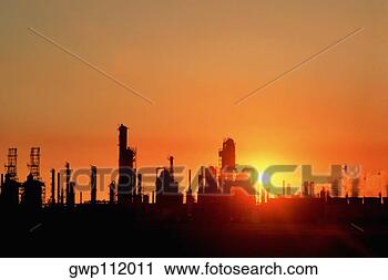 Stock Photography - chemical refinery 
plant and smokestacks 
in silhouette. 
fotosearch - search 
stock photos, 
pictures, images, 
and photo clipart