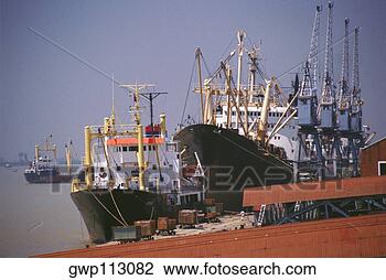Stock Photo - container ships 
moored at a dock, 
yangon, myanmar. 
fotosearch - search 
stock photos, 
pictures, images, 
and photo clipart