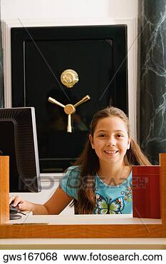 Stock Photo - portrait of a 
girl sitting in 
front of a safe. 
fotosearch - search 
stock photos, 
pictures, images, 
and photo clipart