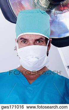 Stock Photo - portrait of a 
male surgeon wearing 
a surgical mask. 
fotosearch - search 
stock photos, 
pictures, images, 
and photo clipart
