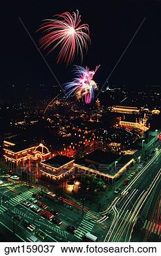 Picture - aerial view of 
buildings in a 
city lit up at 
night,  tivoli 
gardens. fotosearch 
- search stock 
photos, pictures, 
images, and photo 
clipart