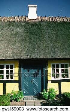 Stock Photo - facade of a cottage, 
funen county, 
denmark. fotosearch 
- search stock 
photos, pictures, 
images, and photo 
clipart