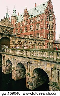 Stock Photography - group of people 
on the bridge 
in front of a 
castle,  frederiksborg. 
fotosearch - search 
stock photos, 
pictures, images, 
and photo clipart