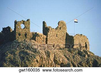 Stock Image - low angle view 
of a flag at a 
ruined castle, 
crusader fort, 
israel. fotosearch 
- search stock 
photos, pictures, 
images, and photo 
clipart