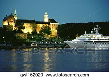 Stock Photography - castle lit up 
at night, akershus 
fortress, oslo, 
norway. fotosearch 
- search stock 
photos, pictures, 
images, and photo 
clipart