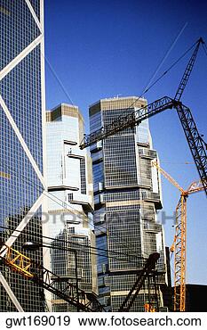 Stock Photograph - cranes at a construction 
site, hong kong, 
china. fotosearch 
- search stock 
photos, pictures, 
images, and photo 
clipart