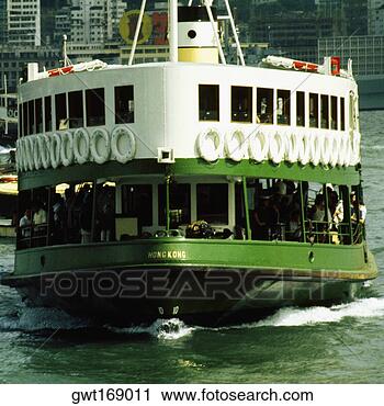 Stock Photography - ferry near a harbor, 
victoria harbor, 
hong kong, china. 
fotosearch - search 
stock photos, 
pictures, images, 
and photo clipart