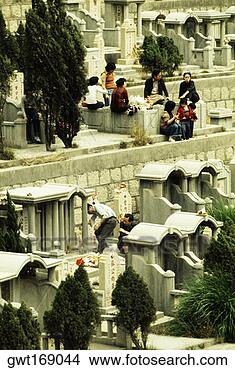 Stock Photo - group of people 
at a cemetery, 
hong kong, china. 
fotosearch - search 
stock photos, 
pictures, images, 
and photo clipart