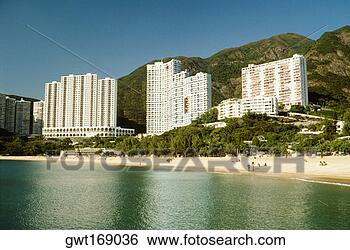 Stock Photo - tourists on the 
beach, hong kong, 
china. fotosearch 
- search stock 
photos, pictures, 
images, and photo 
clipart