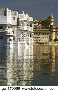 Stock Photograph - reflection of 
a hotel in a lake, 
 lake palace, 
 lake pichola. 
fotosearch - search 
stock photos, 
pictures, images, 
and photo clipart