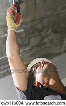 Banco de Imagem - baixo,   ângulo, 
  vista,   macho, 
  construção, 
  trabalhador. 
fotosearch - busca 
de fotos, imagens 
e clipart