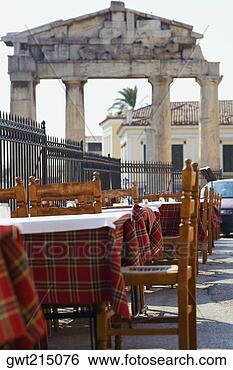 Stock Photo - sidewalk cafe 
in front of the 
old ruins, roman 
agora, athens, 
greece. fotosearch 
- search stock 
photos, pictures, 
images, and photo 
clipart
