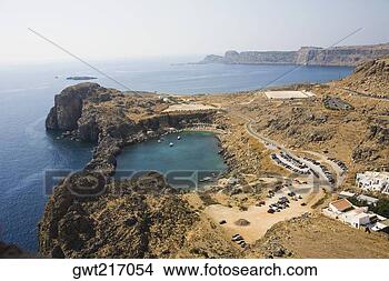 Stock Photo - high angle view 
of a coast, lindos, 
rhodes, dodecanese 
islands, greece. 
fotosearch - search 
stock photos, 
pictures, images, 
and photo clipart