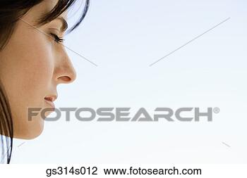 Stock Photo - woman with eyes 
closed. fotosearch 
- search stock 
photos, pictures, 
images, and photo 
clipart