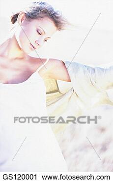 Stock Photography - cardigan, grass, 
tall grass, lightly, 
freedom, movement. 
fotosearch - search 
stock photos, 
pictures, images, 
and photo clipart