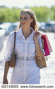 Stock Photo - shopping, woman, 
person, thirty-something, 
outdoors. fotosearch 
- search stock 
photos, pictures, 
images, and photo 
clipart