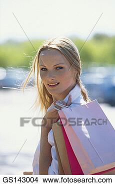 Stock Photo - shopping, woman, 
person, thirty-something, 
outdoors. fotosearch 
- search stock 
photos, pictures, 
images, and photo 
clipart