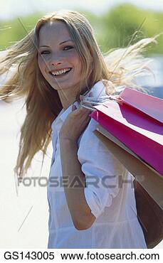 Stock Image - shopping, woman, 
person, thirty-something, 
outdoors. fotosearch 
- search stock 
photos, pictures, 
images, and photo 
clipart