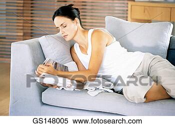 Stock Image - divan, sofa, zen, 
simple, magazine, 
relaxation. fotosearch 
- search stock 
photos, pictures, 
images, and photo 
clipart