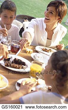 Stock Photography - brochette, barbecue, 
woman, person, 
people, sister. 
fotosearch - search 
stock photos, 
pictures, images, 
and photo clipart