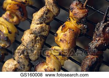 Stock Photo - brochette, grill, 
barbecue, close-up, 
cook, cooking. 
fotosearch - search 
stock photos, 
pictures, images, 
and photo clipart