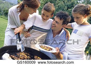 Stock Photograph - brochette, grill, 
barbecue, woman, 
person, people. 
fotosearch - search 
stock photos, 
pictures, images, 
and photo clipart