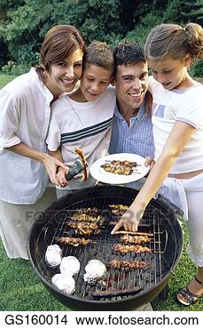 Stock Photo - brochette, grill, 
barbecue, woman, 
person, people. 
fotosearch - search 
stock photos, 
pictures, images, 
and photo clipart