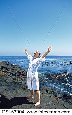 Stock Photo - senior, fitness, 
air, solitude, 
zen, concentration. 
fotosearch - search 
stock photos, 
pictures, images, 
and photo clipart