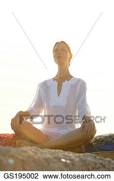 Stock Photo - person, beauty, 
sitting, woman, 
white, purity, 
feminine. fotosearch 
- search stock 
photos, pictures, 
images, and photo 
clipart