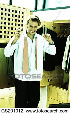 Stock Photo - person, inside, 
interior, indoors, 
happiness, happy. 
fotosearch - search 
stock photos, 
pictures, images, 
and photo clipart