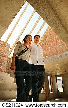Stock Photo - people, person, 
woman, inside, 
interior, indoors, 
couple. fotosearch 
- search stock 
photos, pictures, 
images, and photo 
clipart