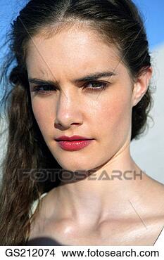 Stock Photo - portrait of a 
frowning dark-haired 
lady. fotosearch 
- search stock 
photos, pictures, 
images, and photo 
clipart