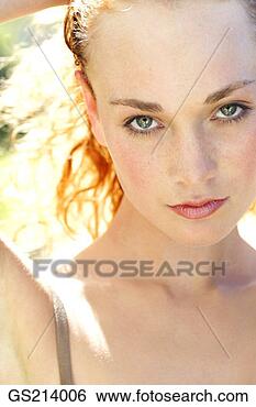 Stock Photo - portrait of a 
red-haired woman. 
fotosearch - search 
stock photos, 
pictures, images, 
and photo clipart