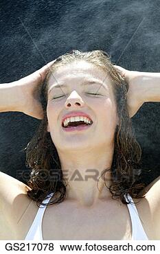 Stock Photo - portrait of a 
woman with closed 
eyes and wet hair. 
fotosearch - search 
stock photos, 
pictures, images, 
and photo clipart