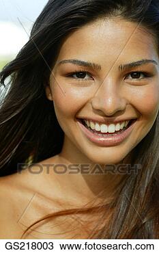 Stock Photo - portrait of a 
smiling dark-haired 
woman. fotosearch 
- search stock 
photos, pictures, 
images, and photo 
clipart